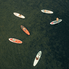 ariel view of several kayaks in lake